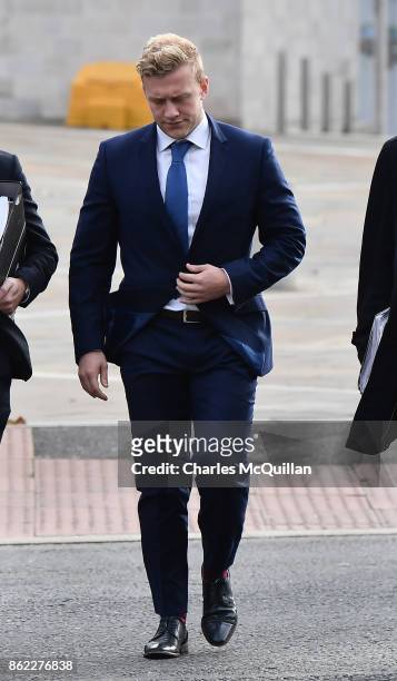 Ireland and Ulster rugby player Stuart Olding arrives at court with his legal advisors at Belfast Magistrates Court relating to a rape charge hearing...