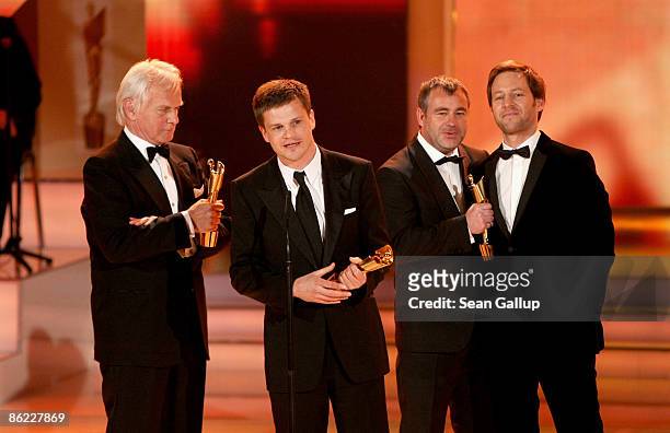 Producers Jan Mojto, Mischa Hofmann, Benjamin Herrmann and director Florian Gallenberger receive their Lola awards during the German Film Award 2009...