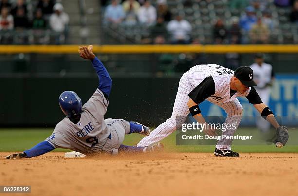 Second baseman Clint Barmes of the Colorado Rockies is unable to get a force out on Juan Pierre of the Los Angeles Dodgers at second base after a...