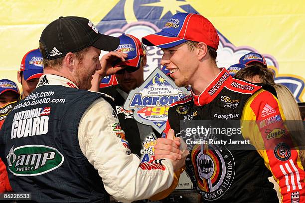 Dale Earnhardt Jr. , driver of the National Guard/Amp Energy Chevrolet, congratulates Brad Keselowski , driver of the Miccosukee Chevrolet, in...