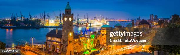 hamburg landungsbrucken elbe st pauli harbour docks illuminated night germany - elbtunnel stock pictures, royalty-free photos & images