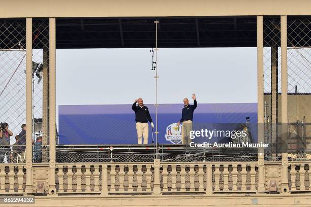 Jim Furyk, Captain of The United States and Thomas Bjorn, Captain of Europe tee off from a platform on the Eiffel Tower during the Ryder Cup 2018...