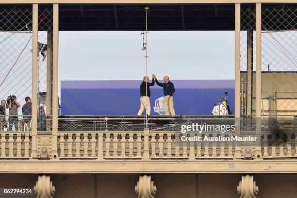 Jim Furyk, Captain of The United States and Thomas Bjorn, Captain of Europe tee off from a platform on the Eiffel Tower during the Ryder Cup 2018...