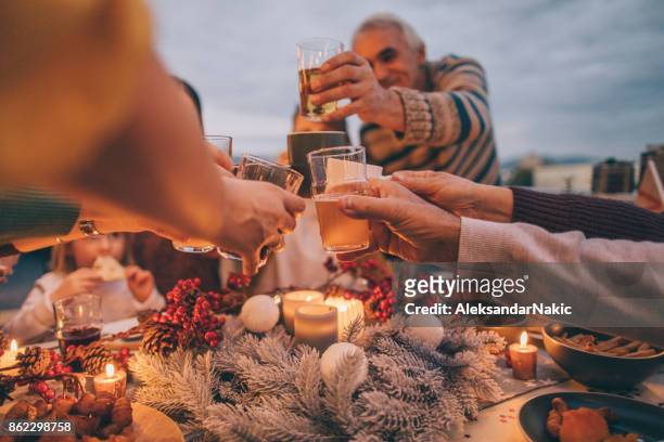 thanksgiving celebratory toast - beer on table stock pictures, royalty-free photos & images