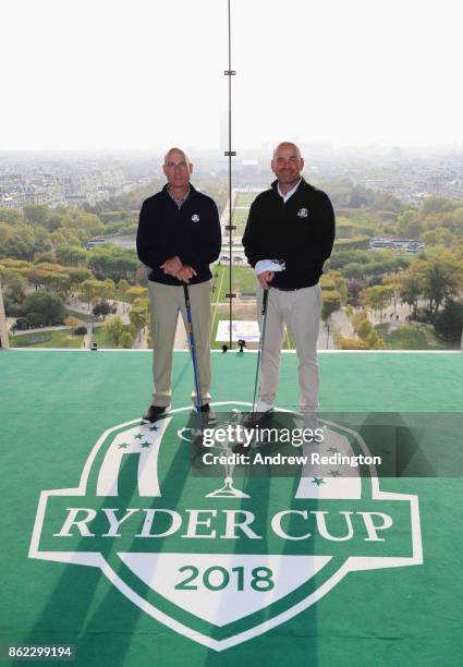 Jim Furyk, Captain of The United States and Thomas Bjorn, Captain of Europe pose on a platform on the Eiffel Tower during the Ryder Cup 2018 Eiffel...