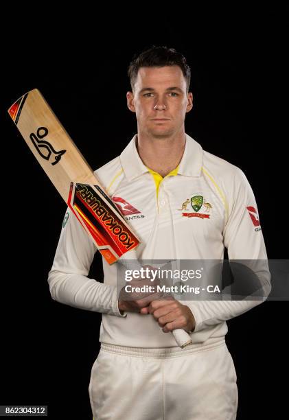 Peter Handscomb of Australia poses during the Australia Test cricket team portrait session at Intercontinental Double Bay on October 15, 2017 in...