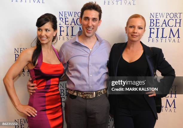 Actress Amie Barsky with producer/actor Paul Alessi and former porn star turned mainstream actress Traci Lords as they arrive for the premiere of the...