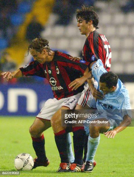 Milan's player Massimo Ambrossini fights for the ball with Celta Vigo's Angel Lopez during the Champions League match in Balaidos stadium in Vigo 01...