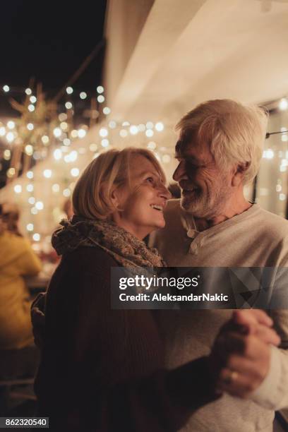 anniversary dance - senior man dancing on table stock pictures, royalty-free photos & images