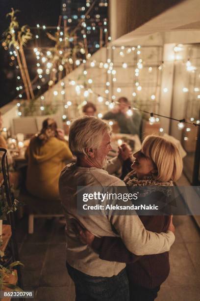 at our anniversary party - senior man dancing on table stock pictures, royalty-free photos & images