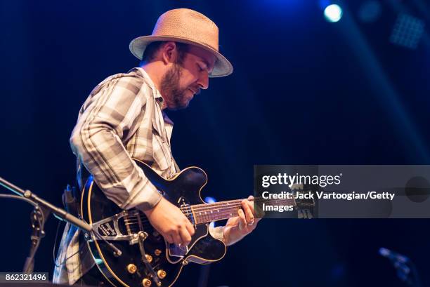 American Rock musician Jackson Smith plays guitar as he performs with his mother, Patti Smith's band, during a tribute to her late husband ,...