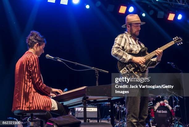 American Rock musicians Jesse Paris Smith , on keyboards, and Jackson Smith, on guitar, perform with their mother, Patti Smith's band, during a...