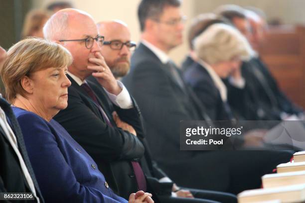 German Chancellor Angela Merkel and Volker Kauder attend the memorial service for the late German politician Heiner Geissler at St. Hedwig Cathedral...