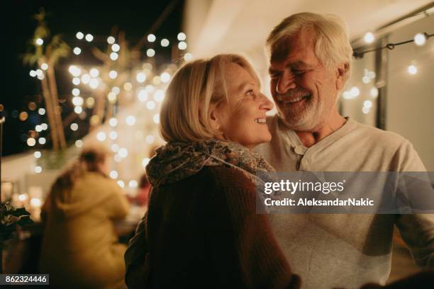 portrait of a senior couple in love - old man woman christmas stock pictures, royalty-free photos & images