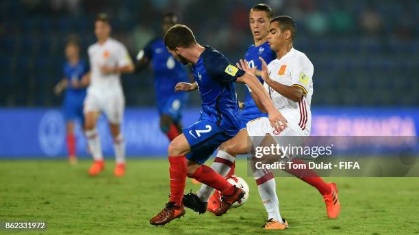 Vincent Collet of France and Mohamed Moukhliss of Spain in action during the FIFA U-17 World Cup India 2017 Round of 16 match between France and...