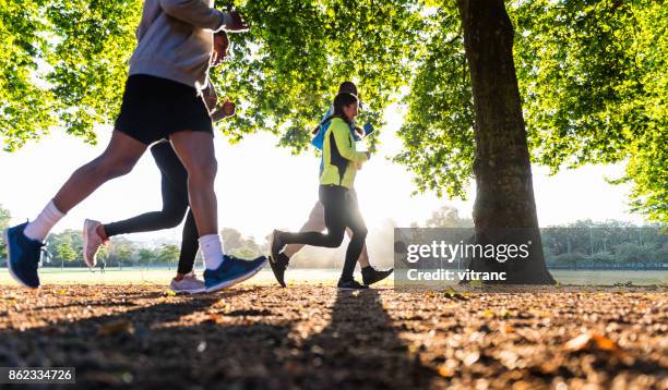 sports team - runner man stock pictures, royalty-free photos & images