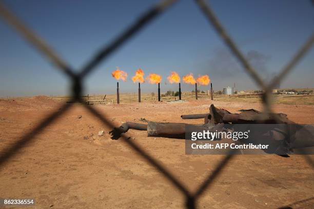 Picture shows Iraq's Bai Hassan oil field west of Kirkuk on October 17, 2017. Iraqi forces took control of the two largest oil fields in the disputed...