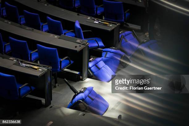 New seats for parliamentarians in the Bundestag are pictured during their installation at the Reichstag on October 17, 2017 in Berlin, Germany....