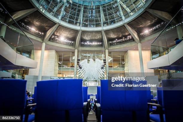 The Federal Eagle and the dome are pictured from the plenary hall at the Bundestag on October 17, 2017 in Berlin, Germany. Following German federal...