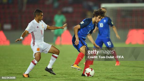 Yacine Adli of France and Mohamed Moukhliss of Spain in action during the FIFA U-17 World Cup India 2017 Round of 16 match between France and Spain...