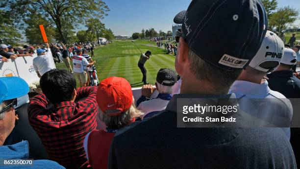 Fans watch play on the second hole during the Sunday singles matches at the Presidents Cup at Liberty National Golf Club on October 1 in Jersey City,...