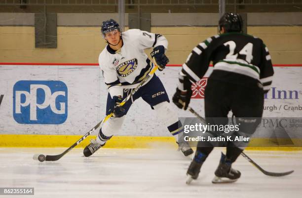 Jaxon Nelson of the Sioux Falls Stampede attempts a shot against Dalton Messina of the Cedar Rapids RoughRiders during the game on Day 2 of the USHL...