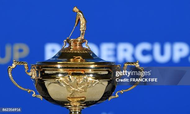 The Ryder Cup's trophy is presented during a press conference on october 17, 2017 in Paris.