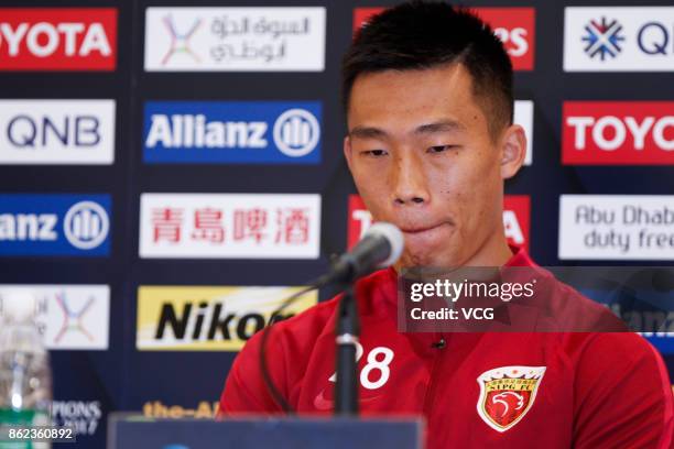 Player He Guan of Shanghai SIPG attends a press conference ahead of the AFC Champions League semi final second leg match between Urawa Red Diamonds...