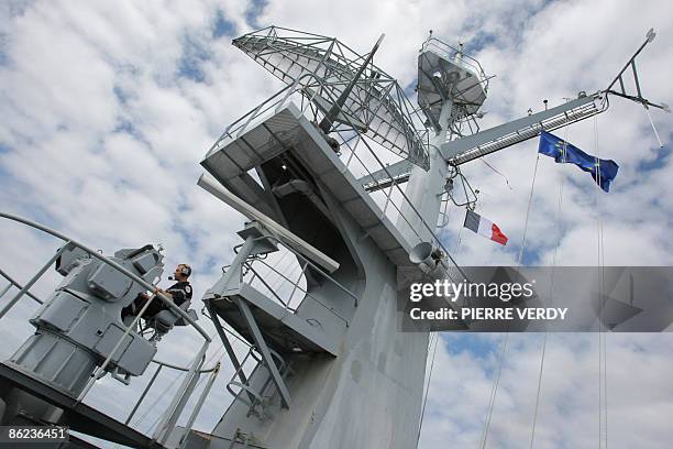 Soldier operates a hundred-millimeter gun aboard French warship "Le Nivose" on April 26 few hours after leaving the Mombasa harbour in Kenya...