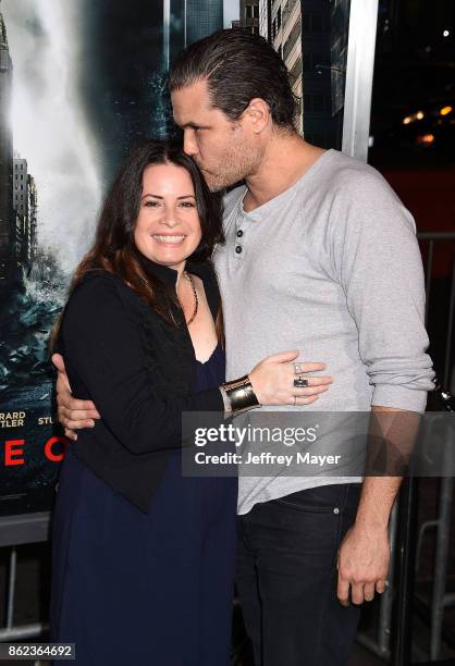 Actress Holly Marie Combs and guest attend the premiere of Warner Bros. Pictures' 'Geostorm' at the TCL Chinese Theatre on October 16, 2017 in...