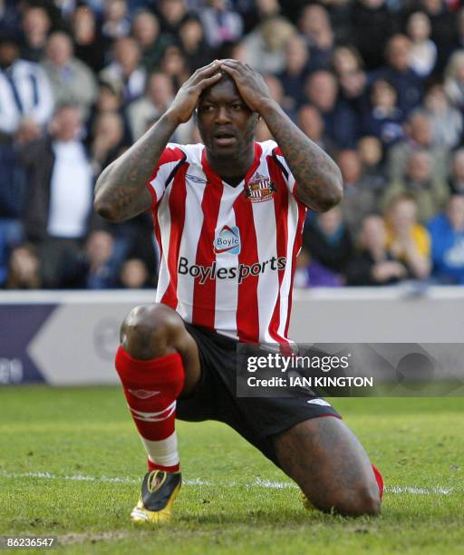 Sunderland's French player Djibril Cisse shows his disappointment during the Premier League football match between West Bromwich Albion and...