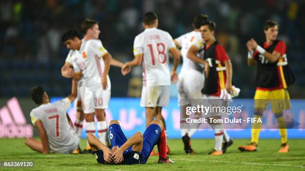 Amine Gouiri of France looks dejected as Spain players celebrate during the FIFA U-17 World Cup India 2017 Round of 16 match between France and Spain...