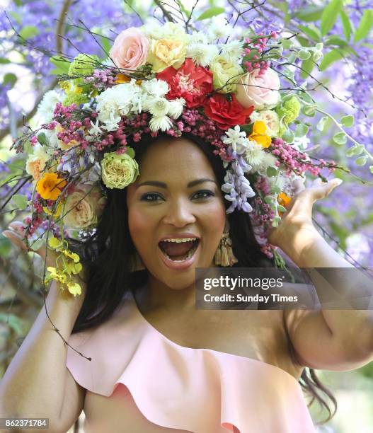 Celebrity chef Siba Mtongana models a headpiece by floral stylist Blomboy ahead of South Africa's second ever Garden Day celebration on October 14,...