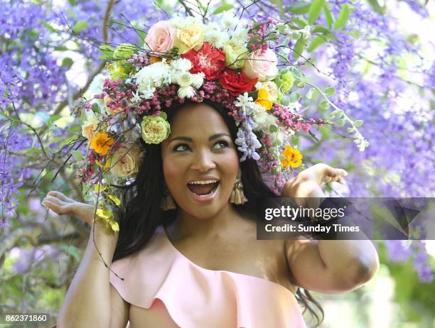 Celebrity chef Siba Mtongana models a headpiece by floral stylist Blomboy ahead of South Africa's second ever Garden Day celebration on October 14,...