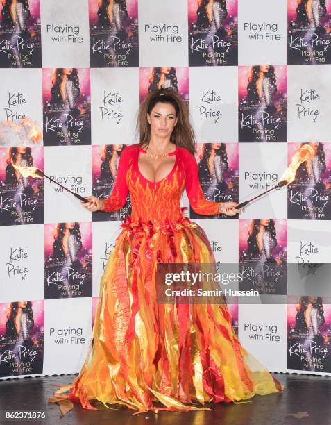 Katie Price attends a photocall for her new novel 'Playing With Fire' at The Worx Studio's on October 17, 2017 in London, England.