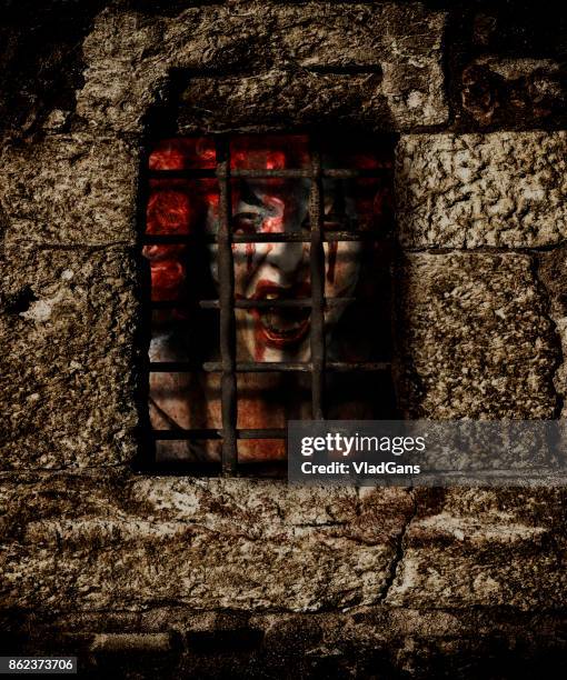 zombie behind the prison bars - gory of dead people stock pictures, royalty-free photos & images