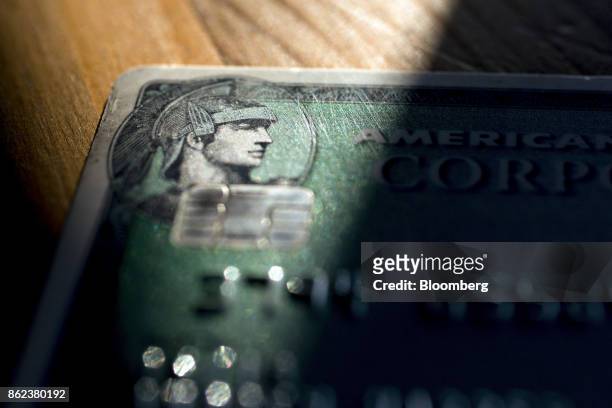 An American Express Co. Chip credit card is arranged for a photograph in Washington, D.C., U.S., on Sunday, Oct. 15, 2017. American Express is...