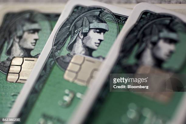American Express Co. Chip credit cards are arranged for a photograph in Washington, D.C., U.S., on Monday, Oct. 16, 2017. American Express is...