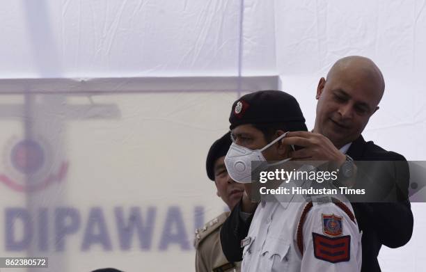 Air Pollution Masks distributed among Delhi Traffic Police personnel to minimize the impact of toxic air at Traffic Police Headquarters, Todapur...