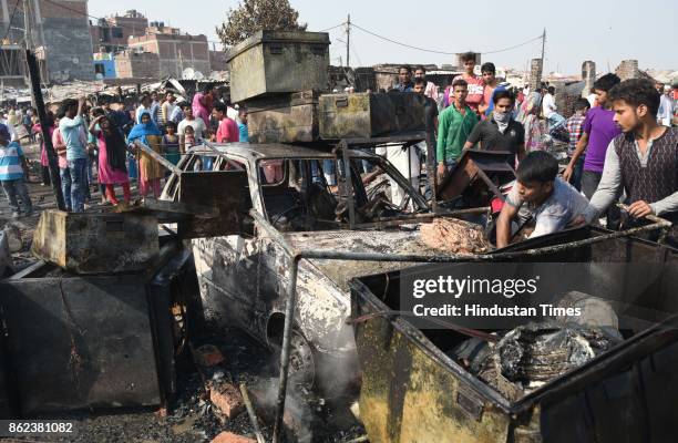 Massive fire breaks out around 11:00 AM at Jamia Nagar near Batla House, injuring two women, three children and many domestic animals and four bikes...