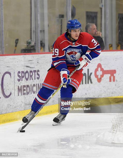 Christopher Lipe of the Des Moines Buccaneers skates with the puck during the game against the Youngstown Phantoms on Day 4 of the USHL Fall Classic...