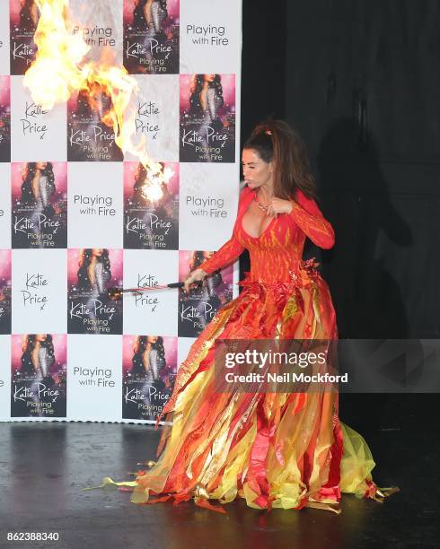 Katie Price 'breathing fire' photocall for her new novel 'Playing With Fire' at The Worx Studio's on October 17, 2017 in London, England.