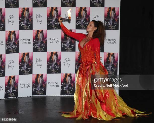 Katie Price 'breathing fire' photocall for her new novel 'Playing With Fire' at The Worx Studio's on October 17, 2017 in London, England.