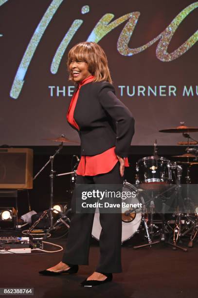 Tina Turner poses at a photocall for "Tina: The Tina Turner Musical" at The Hospital Club on October 17, 2017 in London, England.