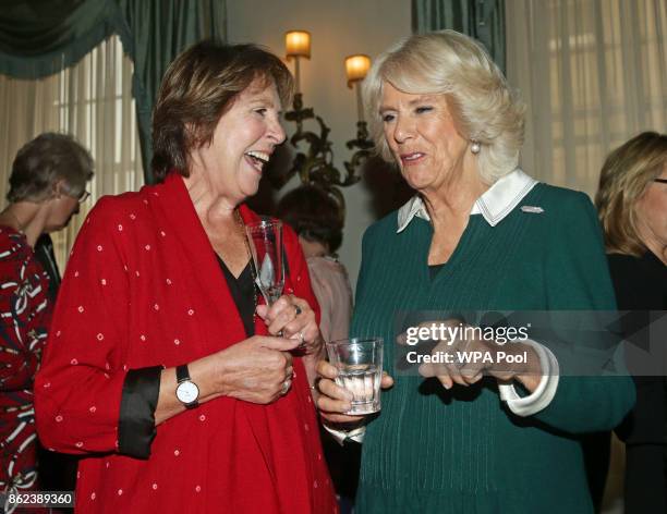 Camilla, Duchess of Cornwall speaks to Dame Penelope Wilton during a reception to celebrate the launch of the 'Our Amazing People' campaign at...