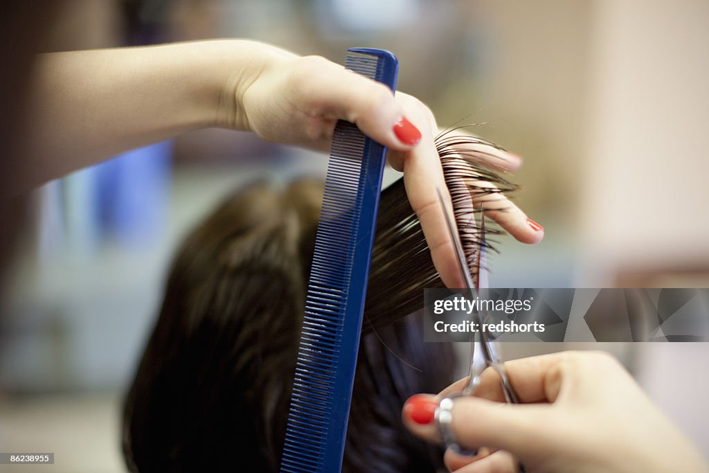 Woman 40s at hairdresser