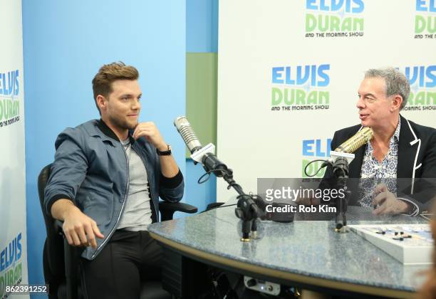 K with host Elvis Duran during a visit to "The Elvis Duran Z100 Morning Show" at Z100 Studio on October 17, 2017 in New York City.