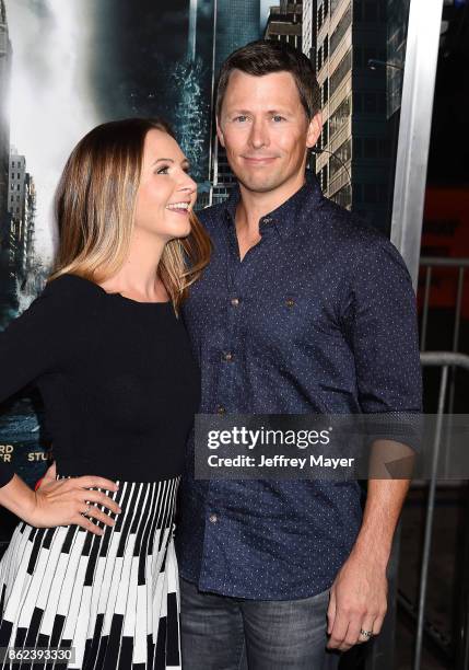 Actress Beverley Mitchell and husband Michael Cameron attend the premiere of Warner Bros. Pictures' 'Geostorm' at the TCL Chinese Theatre on October...