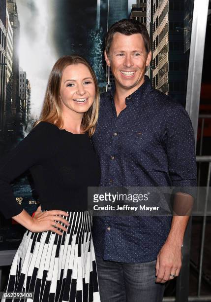 Actress Beverley Mitchell and husband Michael Cameron attend the premiere of Warner Bros. Pictures' 'Geostorm' at the TCL Chinese Theatre on October...