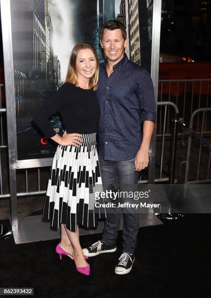 Actress Beverley Mitchell and husband Michael Cameron attend the premiere of Warner Bros. Pictures' 'Geostorm' at the TCL Chinese Theatre on October...